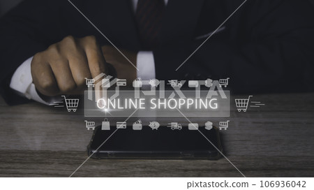 Businessman using mobile phone shopping online with icons E-commerce marketing. Businessman using mobile phone shopping online with icons E-commerce marketing. 106936042