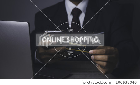 Businessman using mobile phone and credit card shopping online. Businessman using mobile phone and credit card shopping online. 106936046