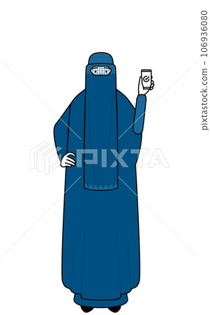 Muslim woman in burqa using smartphone at work Muslim woman in burqa using smartphone at work 106936080
