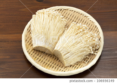 Enoki mushrooms on a tray 106936149