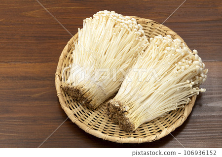 Enoki mushrooms on a tray 106936152
