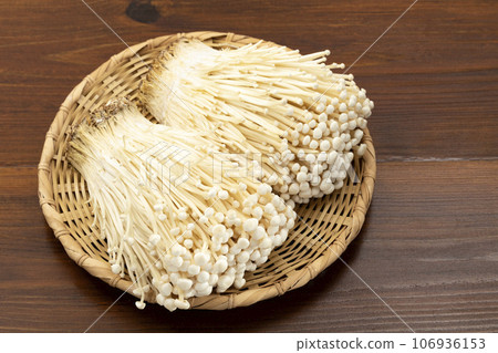 Enoki mushrooms on a tray 106936153