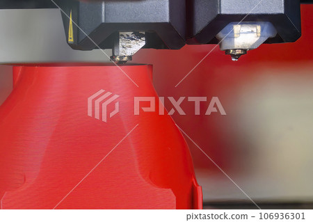 Close up scene the additive manufacturing by 3D printer machine. Close up scene the additive manufacturing by 3D printer machine. 106936301