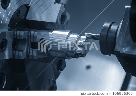 The CNC lathe machine  milling cut the metal shaft parts by milling spindle. 106936303