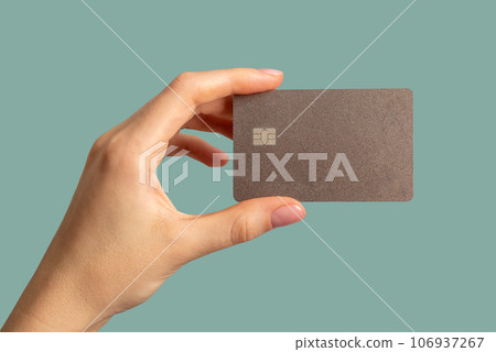Hands holding bank card mock up, plastic mockup Hands holding bank card mock up, plastic mockup 106937267