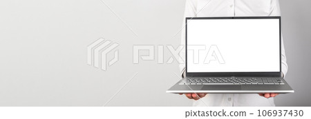 Holding laptop computer screen mockup, banner background Holding laptop computer screen mockup, banner background 106937430
