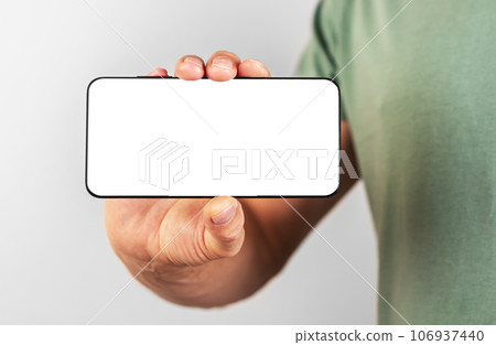 Mobile phone, smartphone mock up, horizontal screen mockup in hand 106937440