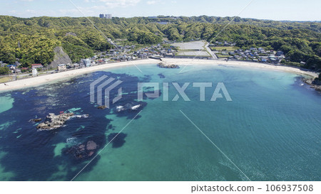 Emerald green sea and white sand beach Emerald green sea and white sand beach 106937508