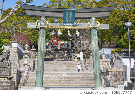 The bronze torii gate and approach to Hofu Tenmangu Shrine in Yamaguchi Prefecture, the god of learning The bronze torii gate and approach to Hofu Tenmangu Shrine in Yamaguchi Prefecture, the god of learning 106937747