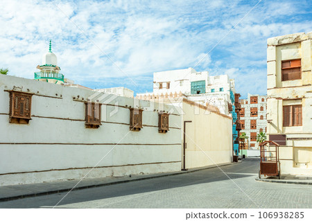 Al-Balad old town streets and traditional muslim houses with wooden windows and balconies, Jeddah, Saudi Arabia Al-Balad old town streets and traditional muslim houses with wooden windows and balconies, Jeddah, Saudi Arabia 106938285