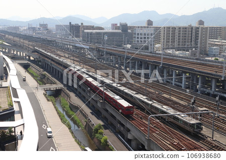 Bantan Line 103 series and JR Kobe Line 223 series new rapid trains near Himeji Station Bantan Line 103 series and JR Kobe Line 223 series new rapid trains near Himeji Station 106938680