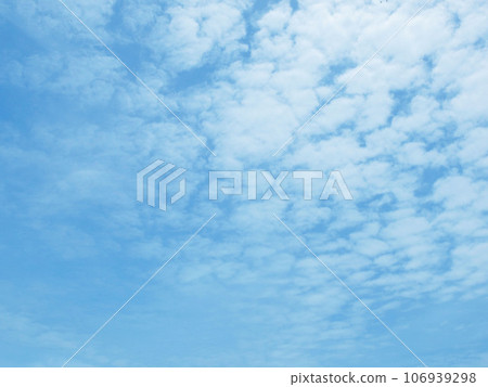 Soft white clouds against blue sky background. Soft white clouds against blue sky background. 106939298