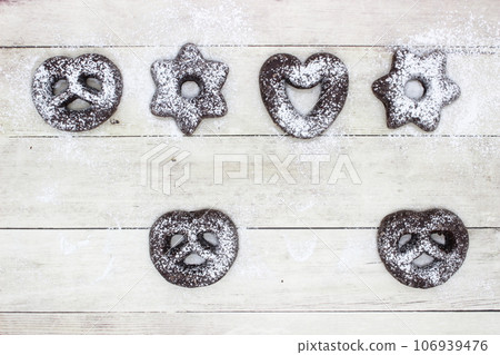 Christmas cookies sprinkled with powdered sugar Christmas cookies sprinkled with powdered sugar 106939476