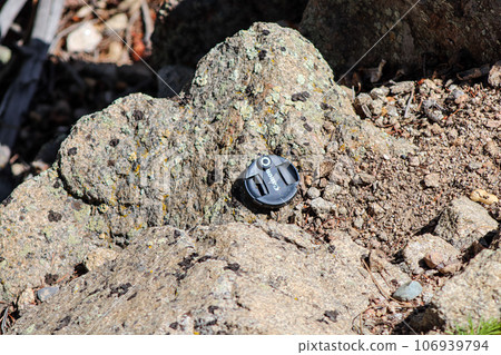 Canon Lens cap lost on the side of mountain 106939794