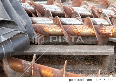 Scrap parts Blending machine screws outside weather rusty Scrap parts Blending machine screws outside weather rusty 106939828