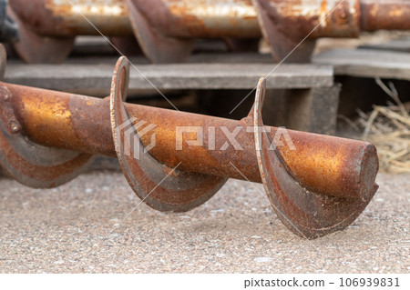 Scrap parts Blending machine screws outside weather rusty Scrap parts Blending machine screws outside weather rusty 106939831