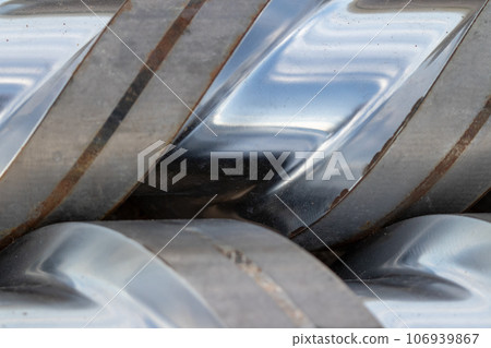 Top view Close-up injection machine screw spare parts injection machine manufacturing process concept. 106939867