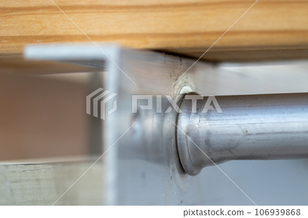 Steel tube support system close up on connecter Steel tube support system close up on connecter 106939868