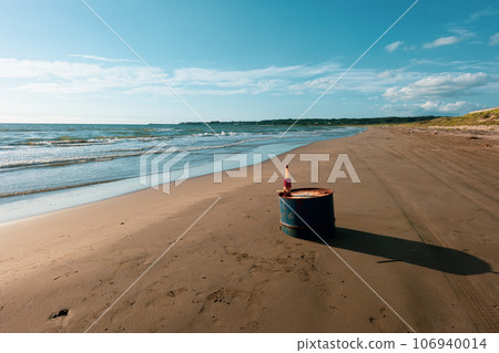 Calm sandy beach at sunset Calm sandy beach at sunset 106940014