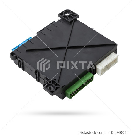 Plastic car engine control unit with metal elements on a white isolated background is the connecting center of various subsystems, units and assemblies. Monitoring the state of the moment. Spare part 106940061