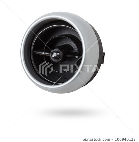 A close-up view of a part of the interior of a modern car with a view of the ventilation deflector of the heater for heating and cooling the passenger compartment. Used auto part catalog from junkyard 106940122