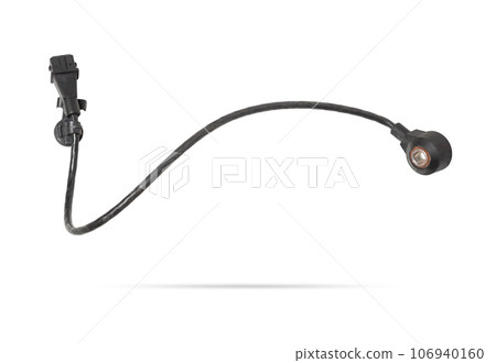 Knock sensor for vehicle engines spare parts electrical parts sensors on white background copy space Knock sensor for vehicle engines spare parts electrical parts sensors on white background copy space 106940160