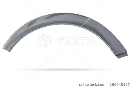 Gray plastic fender flare on a white isolated background in a photo studio for sale or replacement in a car service. Mudguard on auto-parsing for repair or a device to protect the body from dirt. 106940165