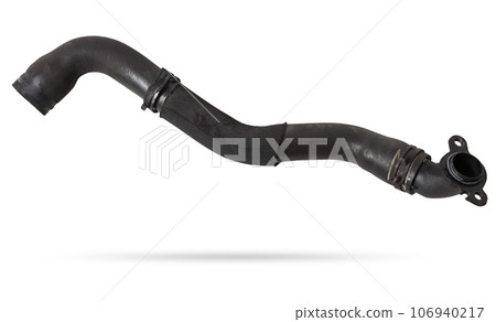 Black rubber hose of the car engine cooling system on a white isolated background in a photo studio for replacement during repair or for a catalog of spare parts for sale on auto disassembly. 106940217