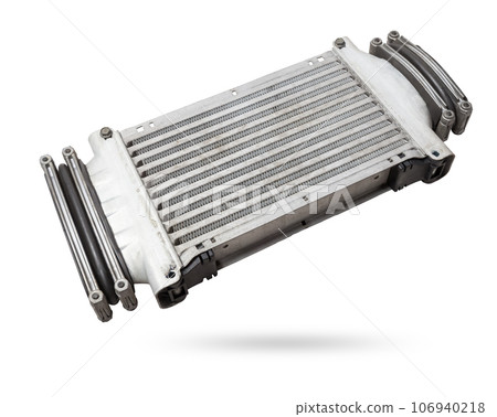 Car intercooler radiator for turbine cooling isolated on white background. Spare cooling system for internal combustion engine Car intercooler radiator for turbine cooling isolated on white background. Spare cooling system for internal combustion engine 106940218