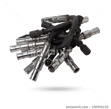 Black ignition wire of a high voltage for spark plug on blue and red background. Car spare parts catalog. Top view. 106940226