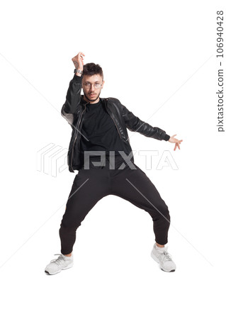 Full-length photo of a funny guy dancing in studio isolated on white background. Full-length photo of a funny guy dancing in studio isolated on white background. 106940428