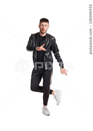 Full-length photo of a funny guy dancing in studio isolated on white background. 106940450