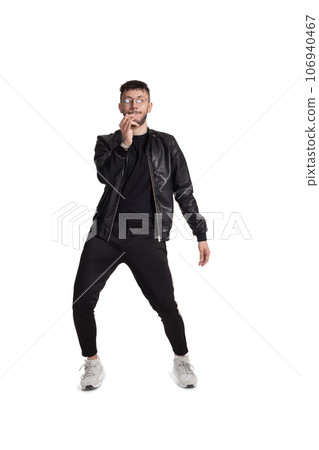 Full-length photo of a funny guy dancing in studio isolated on white background. Full-length photo of a funny guy dancing in studio isolated on white background. 106940467