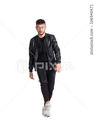 Full-length photo of a funny guy dancing in studio isolated on white background. Full-length photo of a funny guy dancing in studio isolated on white background. 106940471