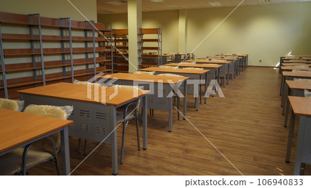 A room with shelves and tables. A room with shelves and tables. 106940833