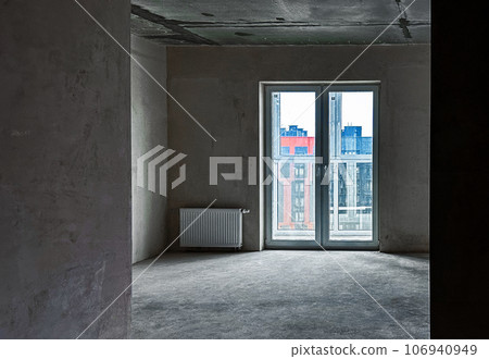 Empty apartment with concrete walls, window, condominium Empty apartment with concrete walls, window, condominium 106940949