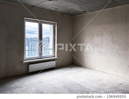 Empty unfurnished apartment, flat with concrete walls, window, new urban condominium Empty unfurnished apartment, flat with concrete walls, window, new urban condominium 106940950