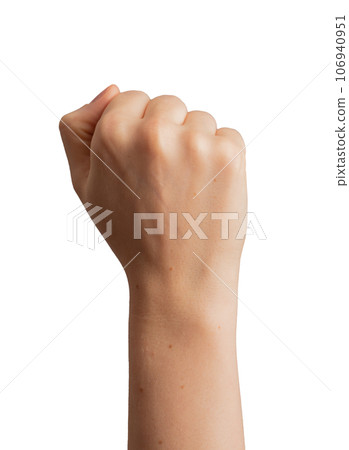 Female fist raised up isolated on white background Female fist raised up isolated on white background 106940951