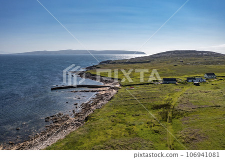 Aerial view of the pier on Owey Island, County Donegal, Ireland Aerial view of the pier on Owey Island, County Donegal, Ireland 106941081