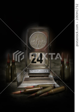 Bullets, vintage calendar and Ukrainian flag on camouflage background in darkness 106941732