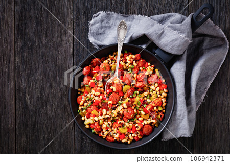 Hoppin John of black-eyed peas, veggies, sausages Hoppin John of black-eyed peas, veggies, sausages 106942371
