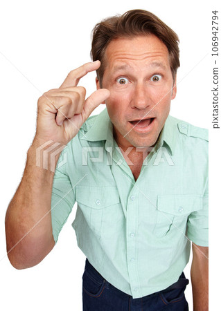 Portrait, man and hand sign for small size or length while surprised and shocked about wow finger mockup. Face of male model isolated on white background for advertising product, scale or measurement 106942794