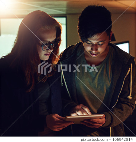 Planning, tablet and research with people in office at night for teamwork, web design and strategy. Creative, collaboration and technology with man and woman in startup for data, proposal and idea Planning, tablet and research with people in office at night for teamwork, web design and strategy. Creative, collaboration and technology with man and woman in startup for data, proposal and idea 106942814