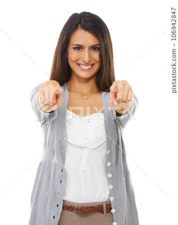 Woman, pointing and portrait of a model in isolated white background with happiness and mockup. Casual fashion, point and beautiful Indian person happy with a smile and hand sign with mock up alone Woman, pointing and portrait of a model in isolated white background with happiness and mockup. Casual fashion, point and beautiful Indian person happy with a smile and hand sign with mock up alone 106942847