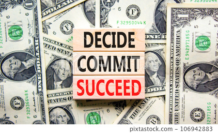 Decide commit succeed symbol. Concept word Decide Commit Succeed on beautiful wooden block. Dollar bills. Beautiful dollar bills background. Business decide commit succeed concept. Copy space. Decide commit succeed symbol. Concept word Decide Commit Succeed on beautiful wooden block. Dollar bills. Beautiful dollar bills background. Business decide commit succeed concept. Copy space. 106942883