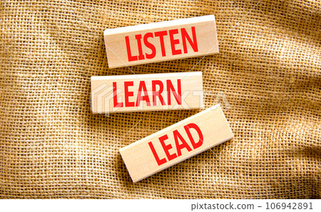 Listen learn lead symbol. Concept word Listen Learn Lead on beautiful wooden block. Beautiful canvas table canvas background. Business education listen learn lead concept. Copy space Listen learn lead symbol. Concept word Listen Learn Lead on beautiful wooden block. Beautiful canvas table canvas background. Business education listen learn lead concept. Copy space 106942891