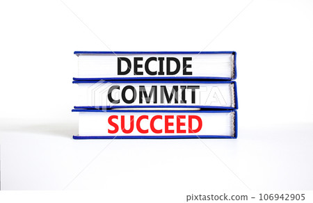 Decide commit succeed symbol. Concept word Decide Commit Succeed on beautiful books. Beautiful white table white background. Business decide commit succeed concept. Copy space. 106942905