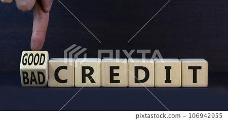 Good or bad credit symbol. Turned wooden cubes and changed concept words Bad credit to Good credit. Beautiful grey table grey background, copy space. Business good or bad credit concept. Good or bad credit symbol. Turned wooden cubes and changed concept words Bad credit to Good credit. Beautiful grey table grey background, copy space. Business good or bad credit concept. 106942955