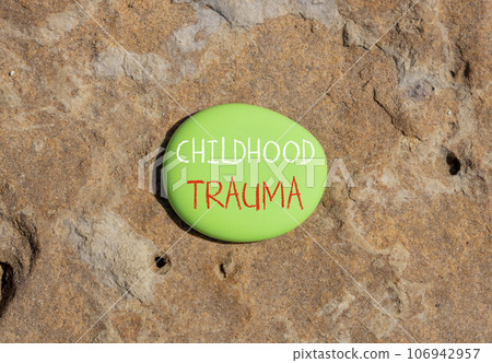 Childhood trauma symbol. Concept words Childhood trauma on beautiful big green stone. Beautiful stone wall background. Business psychology childhood trauma concept. Copy space. Childhood trauma symbol. Concept words Childhood trauma on beautiful big green stone. Beautiful stone wall background. Business psychology childhood trauma concept. Copy space. 106942957