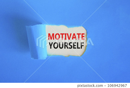 Motivate yourself symbol. Concept words Motivate yourself on beautiful white paper. Beautiful blue paper background. Business psychology motivate yourself concept. Copy space. 106942967